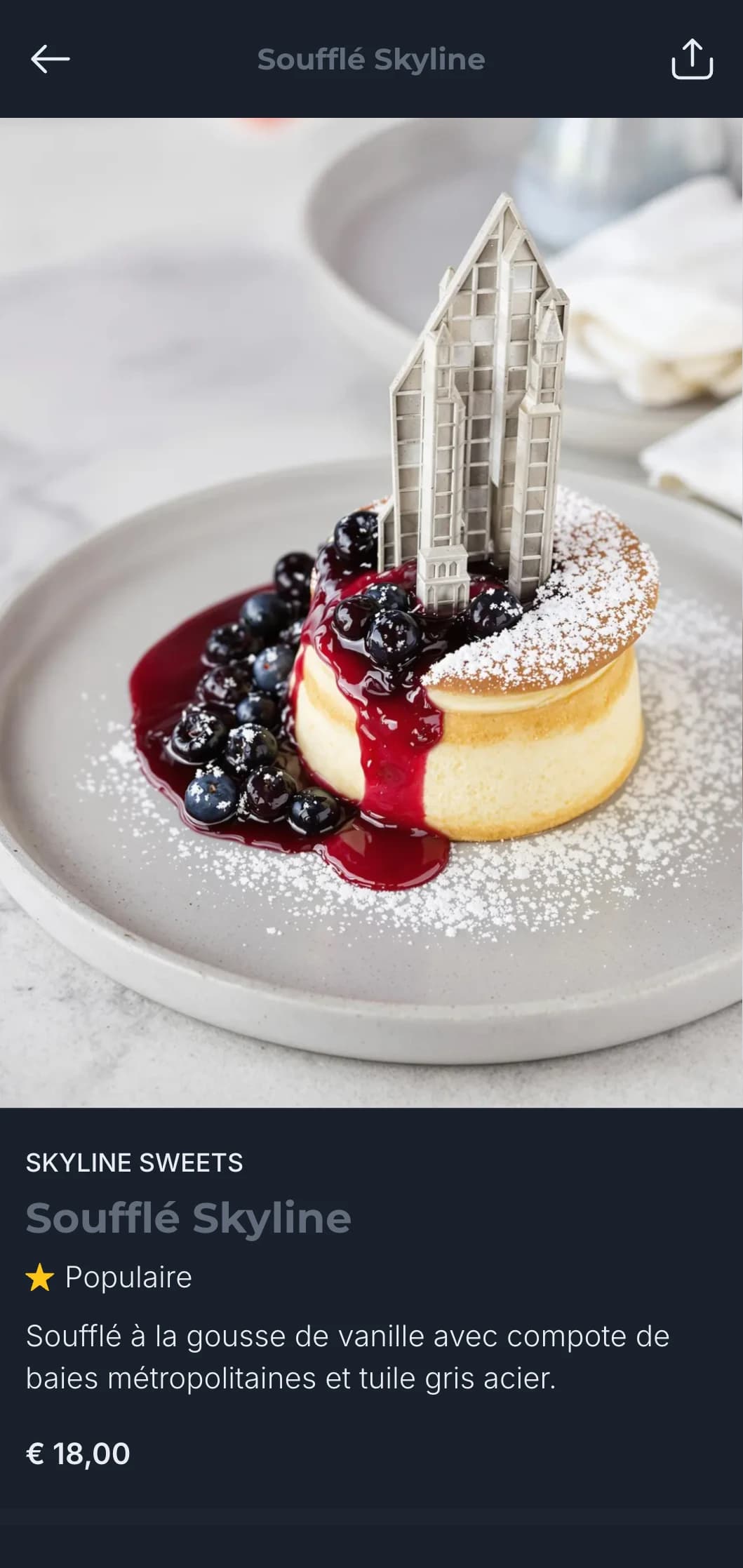 Concept urbain raffiné avec des tons d'ardoise et des éléments architecturaux pour des repas urbains contemporains.