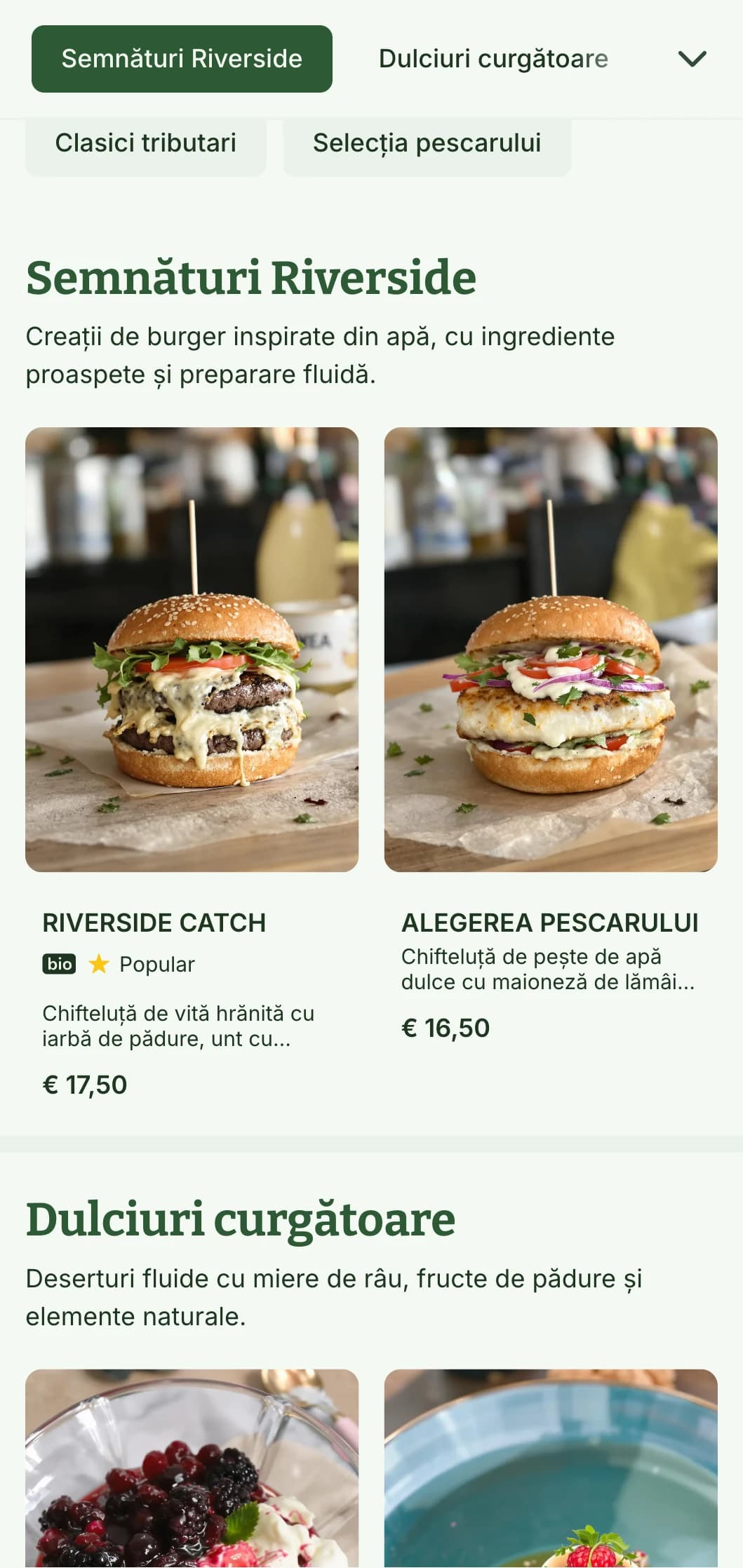 Experiență Riverside Burger cu elemente de apă și paleta naturală albastru-verde.