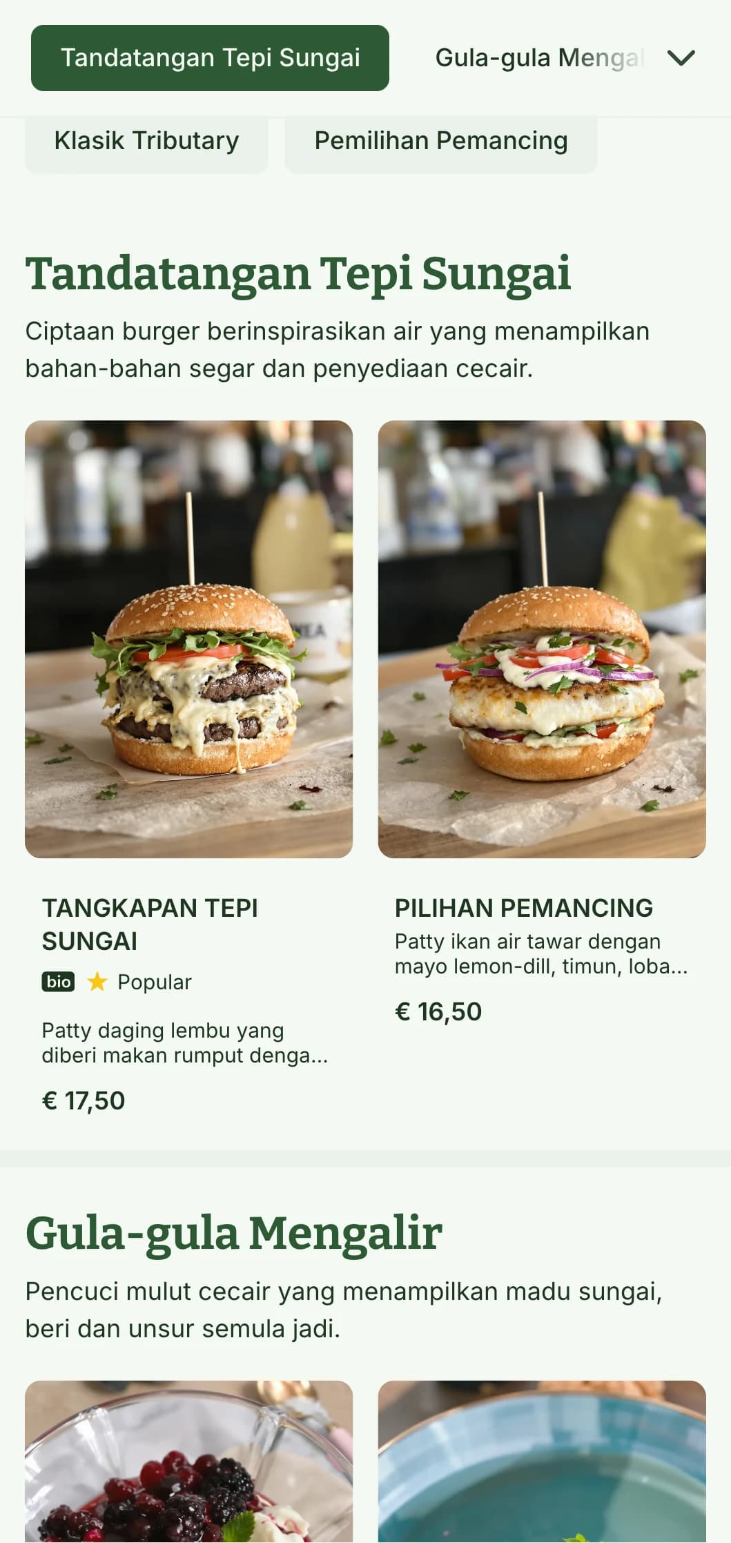 Pengalaman burger tepi sungai dengan unsur air dan palet biru-hijau semula jadi.
