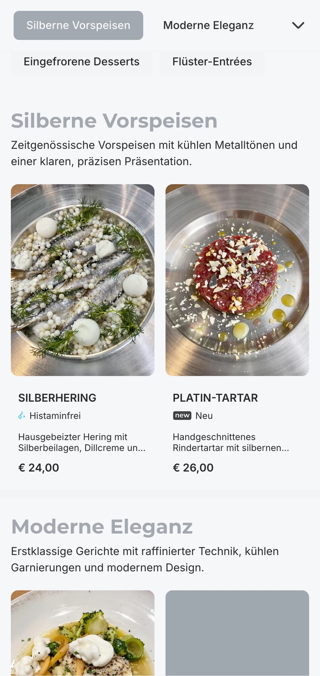 Anspruchsvolles modernes Konzept mit kühlen Silbertönen und subtilen Luxuselementen für ein unaufdringlich elegantes Erlebnis.