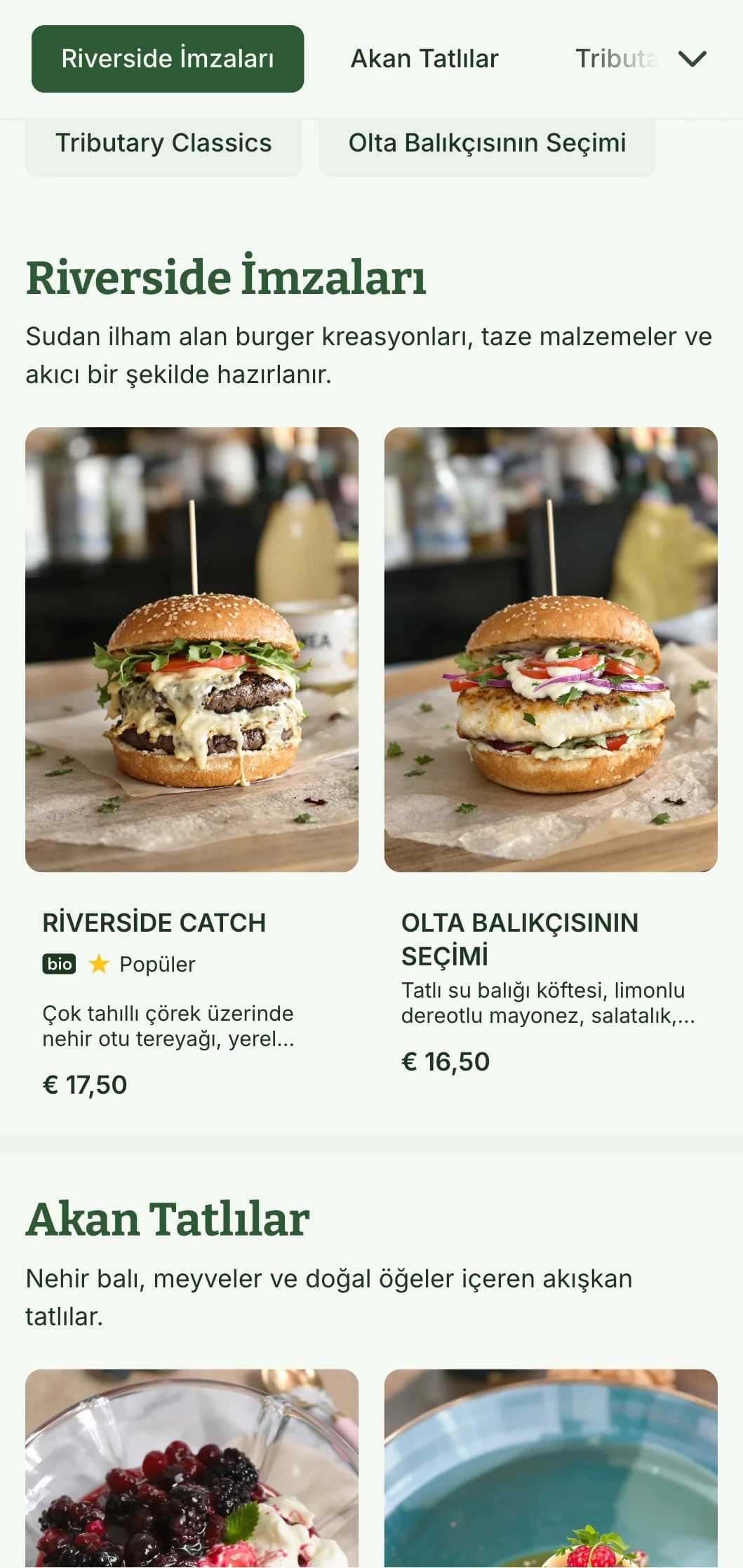 Su öğeleri ve doğal mavi-yeşil paleti ile Riverside burger deneyimi.