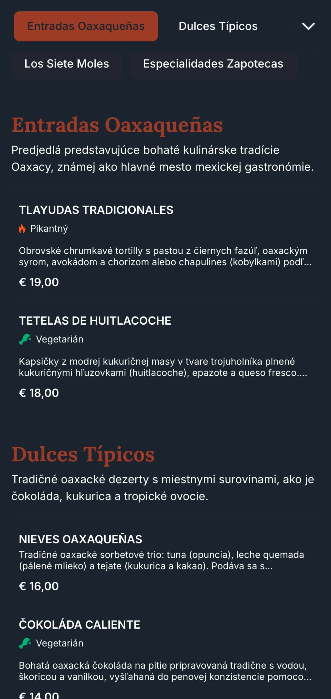 Bohaté a zemité menu oslavujúce kulinárske tradície Oaxacy s terakotovými akcentmi, domorodými vzormi a špecialitami z krtka.