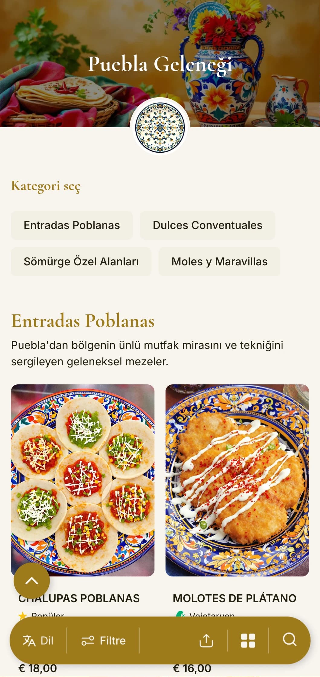 Puebla'nın zengin mutfak mirasını kutlayan rafine menüde altın vurgular, talavera desenleri ve otantik köstebek poblano yemekleri yer alıyor.