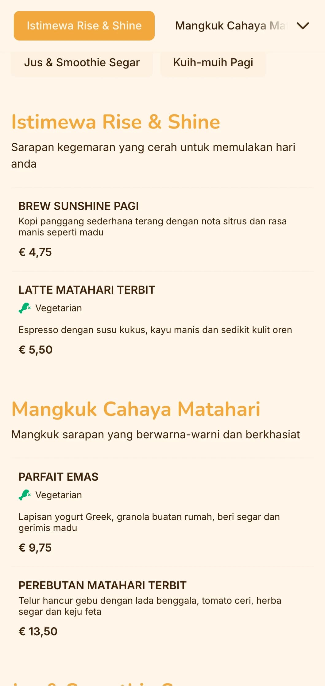 Reka bentuk kuning dan oren yang ceria dengan unsur-unsur cerah untuk pengunjung sarapan pagi dan tempat makan tengah hari.