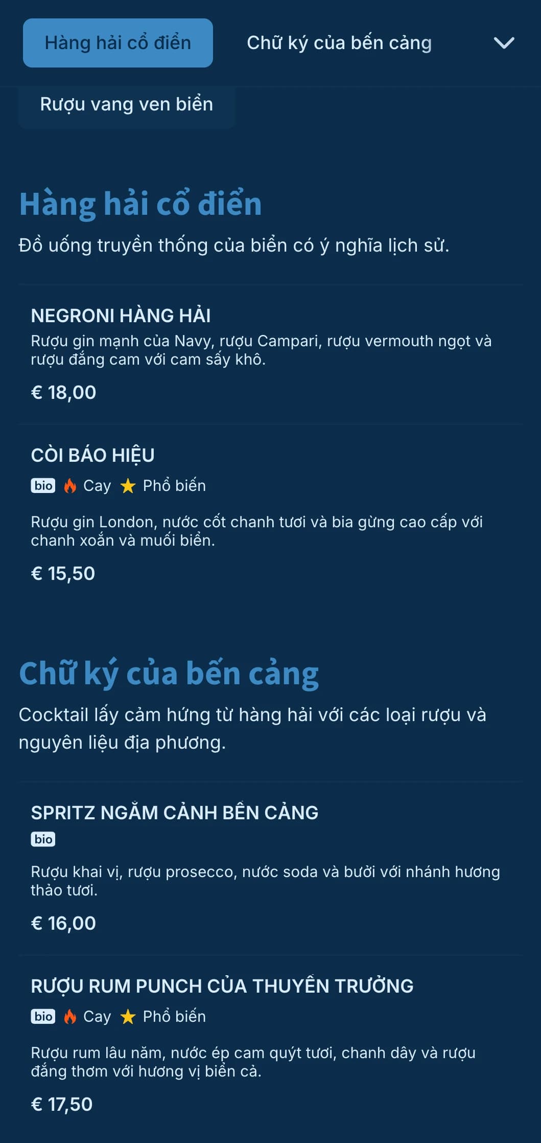 Thiết kế màu xanh hải quân với các yếu tố hàng hải tinh tế dành cho quầy bar cocktail ven sông.